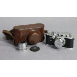 A REID & SIGRIST “REID” CAMERA (NO. P 1910) with two Taylor-Hobson lenses; & with a leather case.