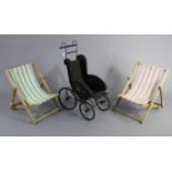 A Victorian-style dolls pram; & two child’s deckchairs