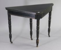 A late Victorian aesthetic-style ebonised & gilt card table inset green baize to the fold-over