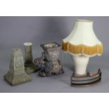 A pottery table lamp with shade; two garden pedestals, an ‘elephant’ jardiniere, & a fire-front.