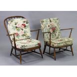 An Ercol spindle-back easy chair with loose cushion to the seat & back, on round tapered legs; & a