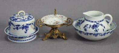 A Minton’s china blue & white floral decorated stilton dish (w.a.f.); a similar matched toilet jug &