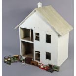 A mid-20th century white painted wooden two-storey doll’s house, 36” wide x 38¾” high x 20½” deep;