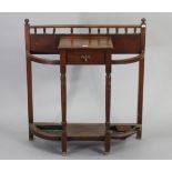 An Edwardian mahogany low hallstand fitted with centre frieze drawer & on turned front supports &
