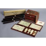 A set of bone Mah Jongg tiles contained in a five-drawer chest, 9” wide x 6” high (lacking sliding