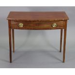 A 19th century mahogany bow-front side table with plain rectangular top, fitted single frieze drawer