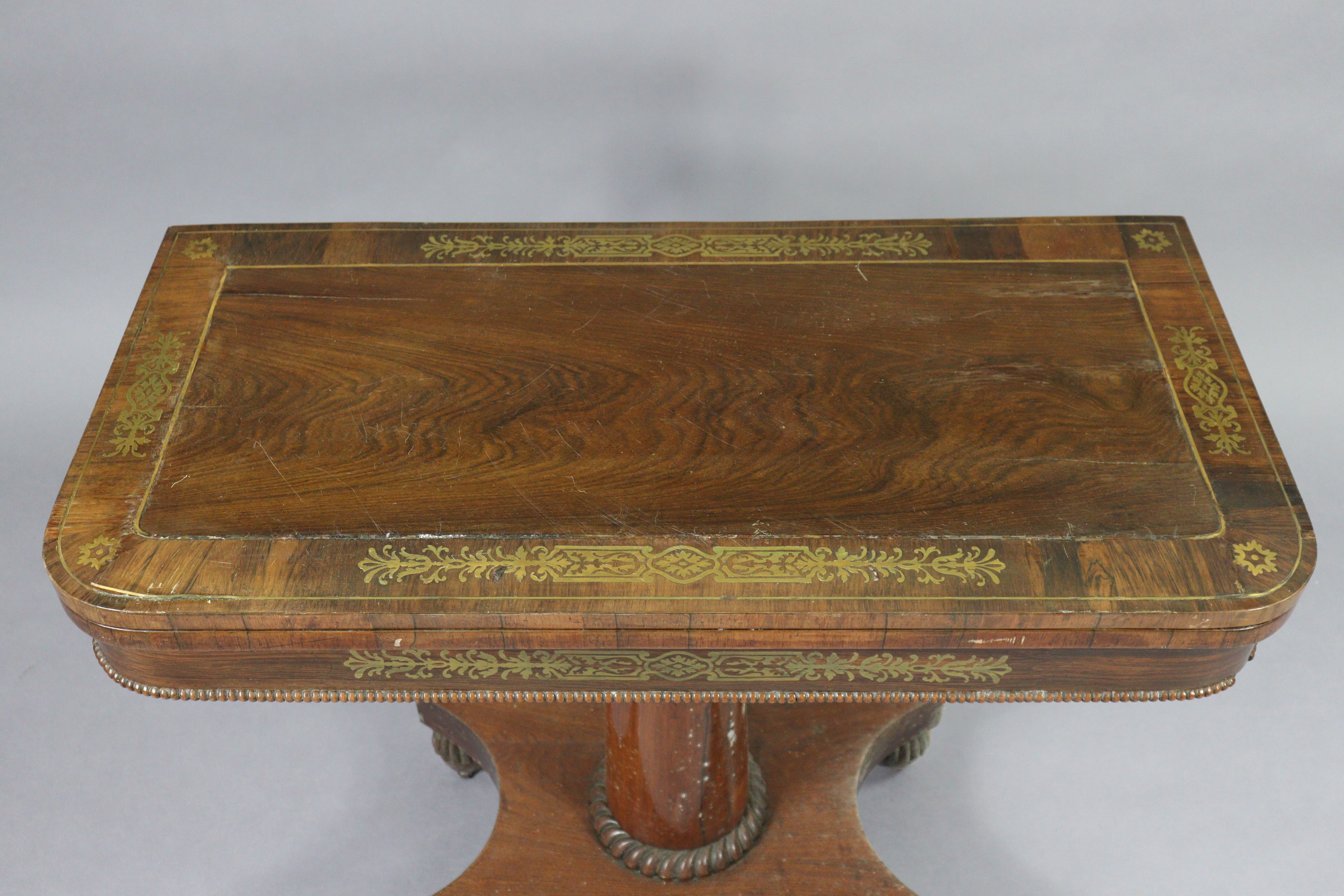 An early 19th century brass-inlaid card table, with rounded corners to the rectangular top, inset gr - Image 2 of 5