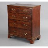 A late 18th/early 19th century mahogany chest, with moulded edge to the plain rectangular top,