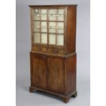 A 19th century inlaid mahogany display cabinet, fitted two shelves to the top, enclosed by pair of