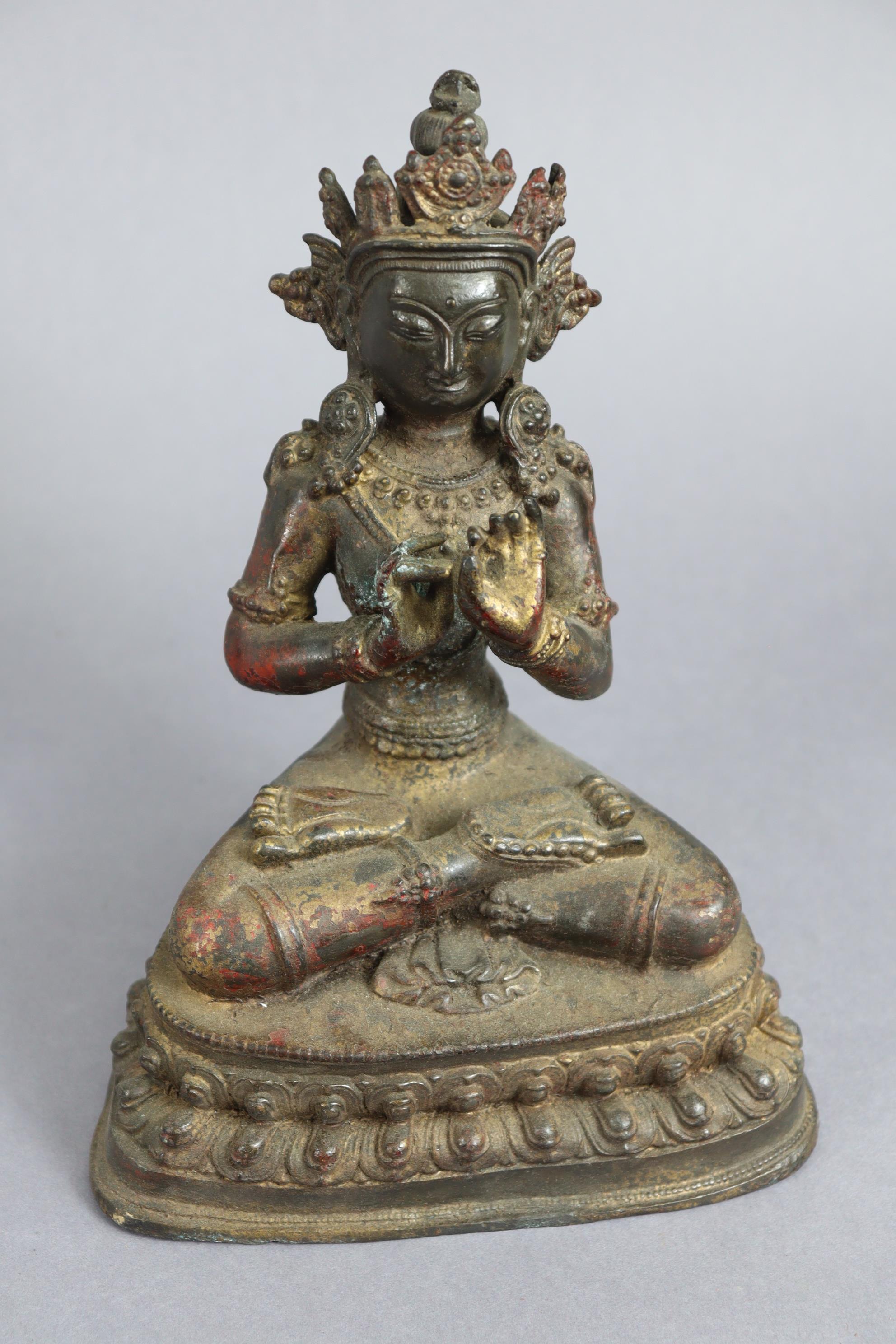 A Sino-Tibetan bronze model of a Boddhisattva, seated on double-lotus base, 9½” high. - Image 5 of 6