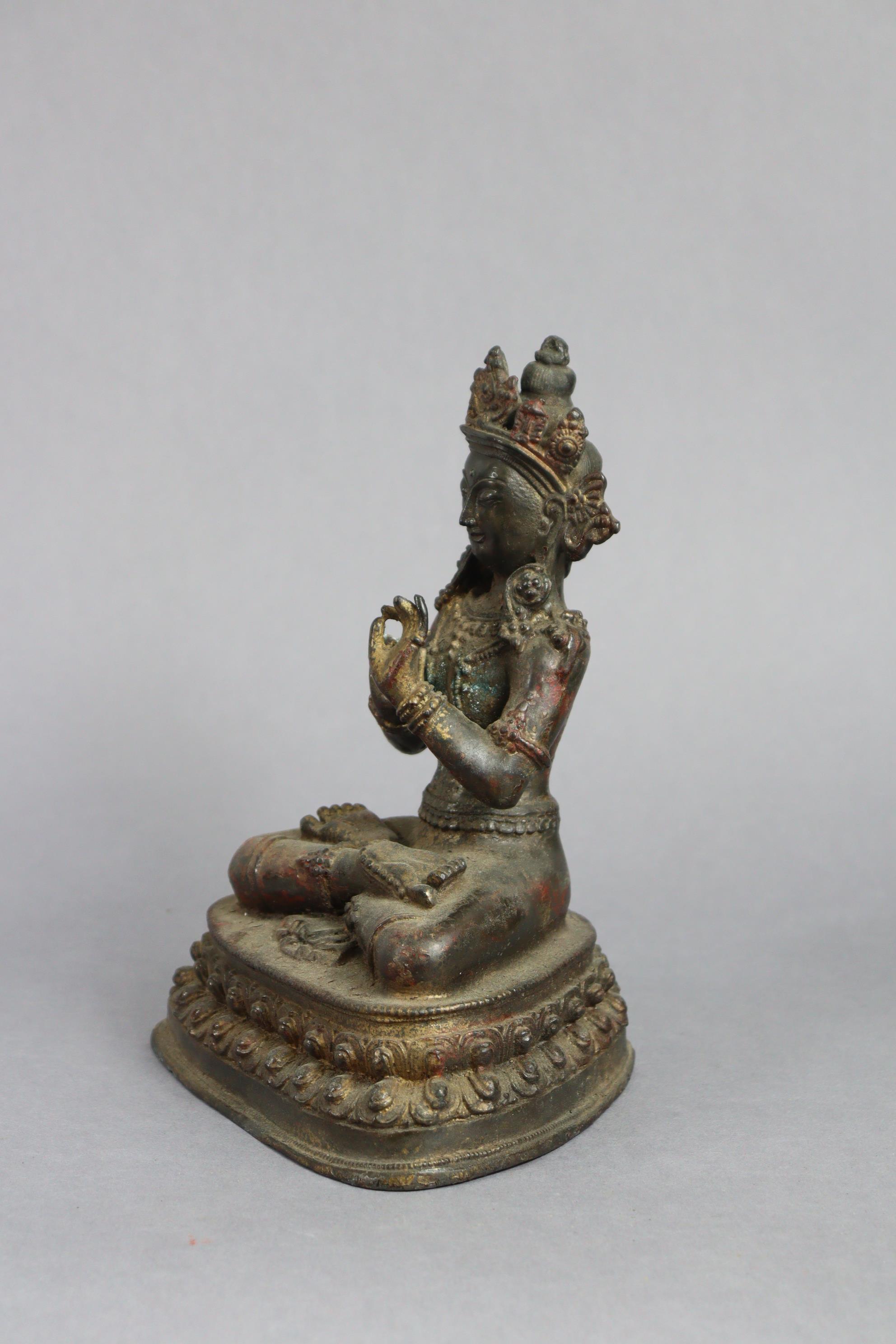 A Sino-Tibetan bronze model of a Boddhisattva, seated on double-lotus base, 9½” high. - Image 3 of 6