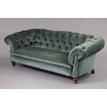 A Chesterfield sofa, upholstered light blue velour, on short turned legs, 70” wide x 25” high x