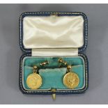 A pair of un-marked yellow metal earrings, each with pendant 19th century USA gold “Liberty Head” $1