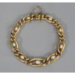 A 9ct. gold curb link bracelet set small oval opals at intervals, approx. 7¾” long. (12 gm).