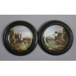 A pair of continental porcelain circular plaques depicting a Tyrolean shepherd & shepherdess, each