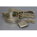 A Victorian silver & two-colour gilt stiff hinged bangle & matching earrings with pierced & engraved