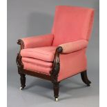 A William IV mahogany frame library armchair upholstered red fabric with loose cushions, carved