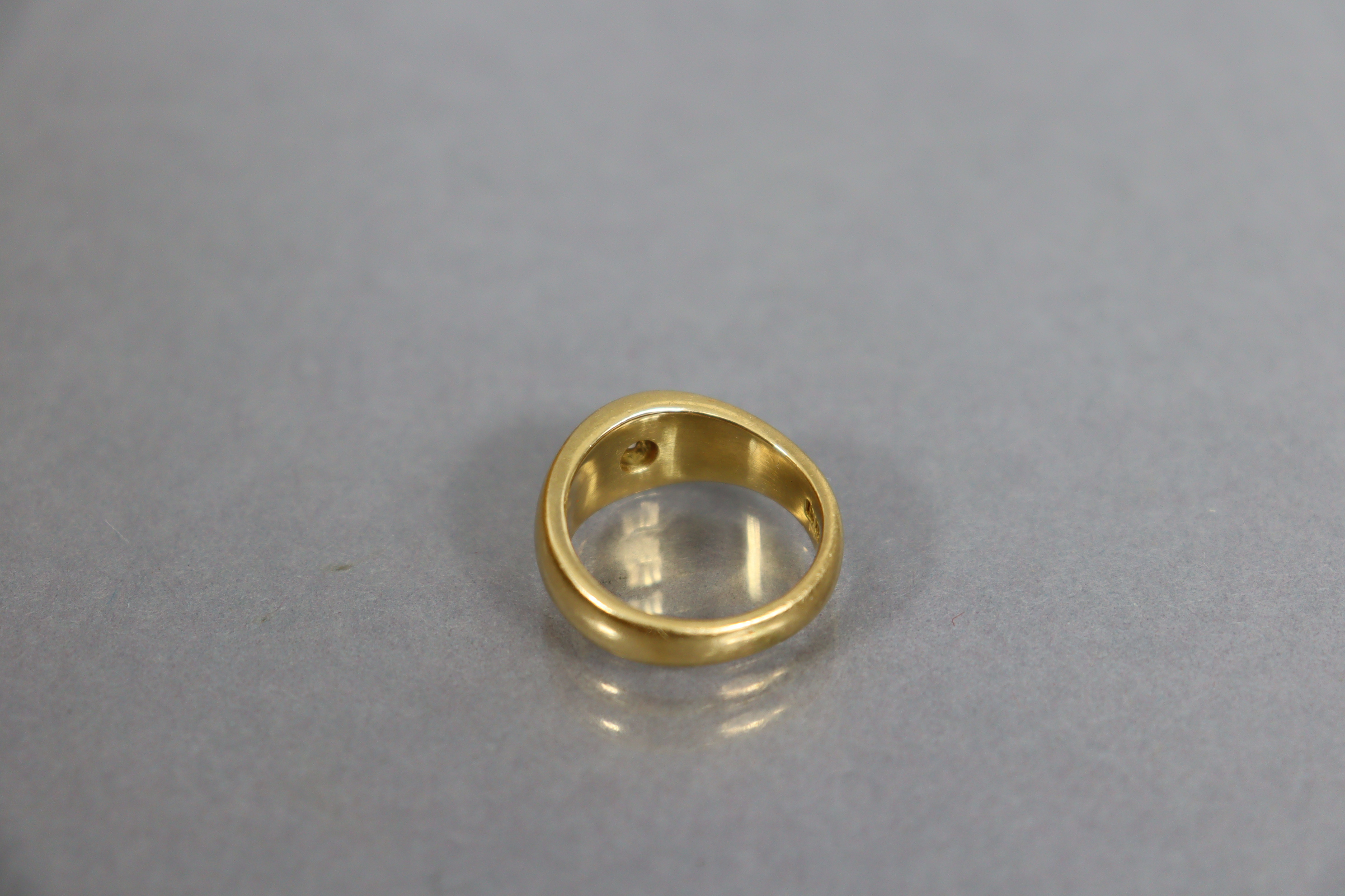 An Edwardian heavy 18ct. gold gent’s ring, gypsy-set with a small diamond; size: S; weight: 14.7gm. - Image 3 of 3