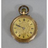 A late 19th/early 20th century continental ladies’ fob watch in engraved 14K case, the engraved gilt