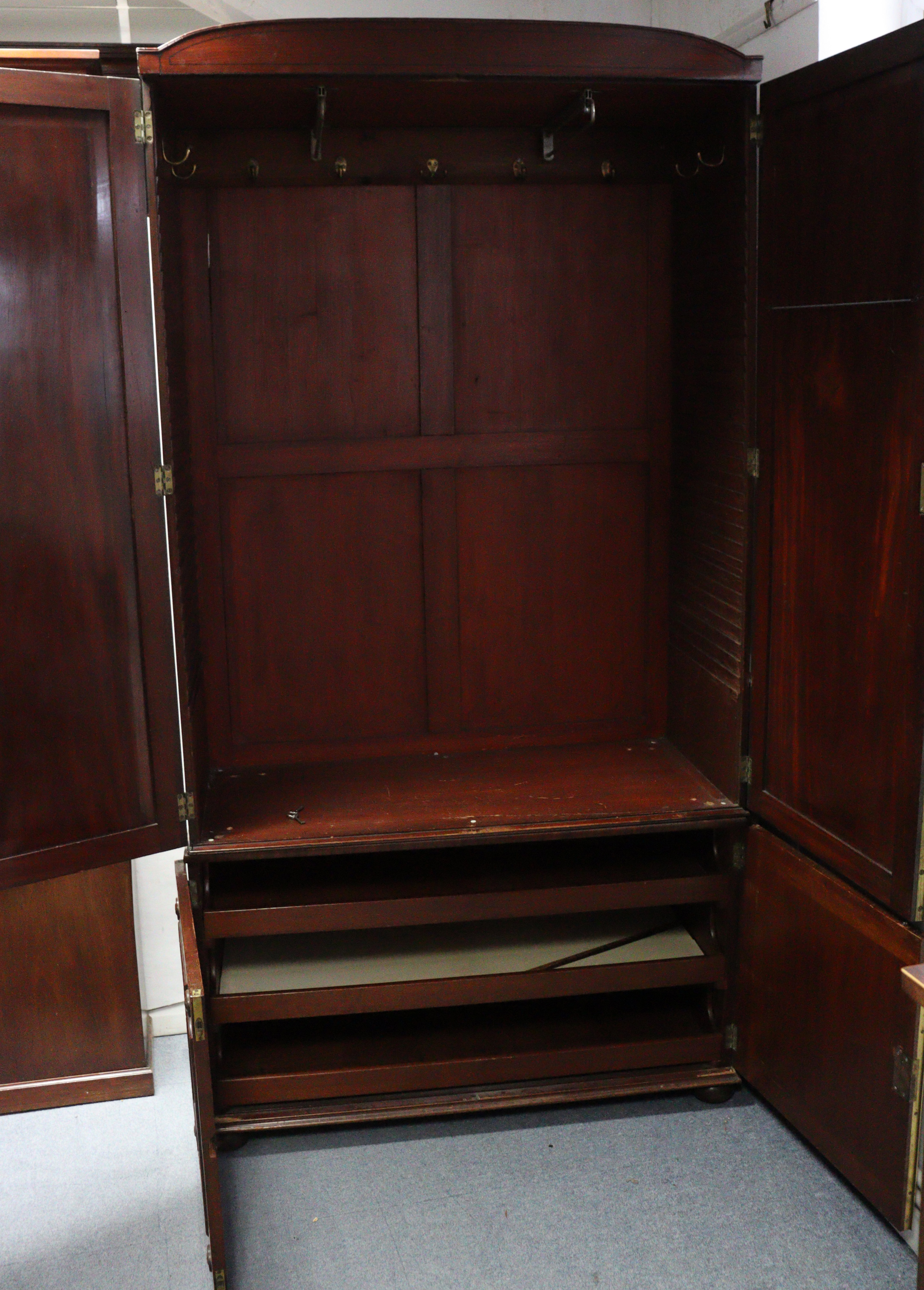 A 19th century inlaid mahogany wardrobe with a hanging compartment enclosed by pair of panel - Image 3 of 7