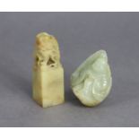 A Chinese russet jade scholar’s seal with carved foo dog handle, & incised inscription below, 2½”; &