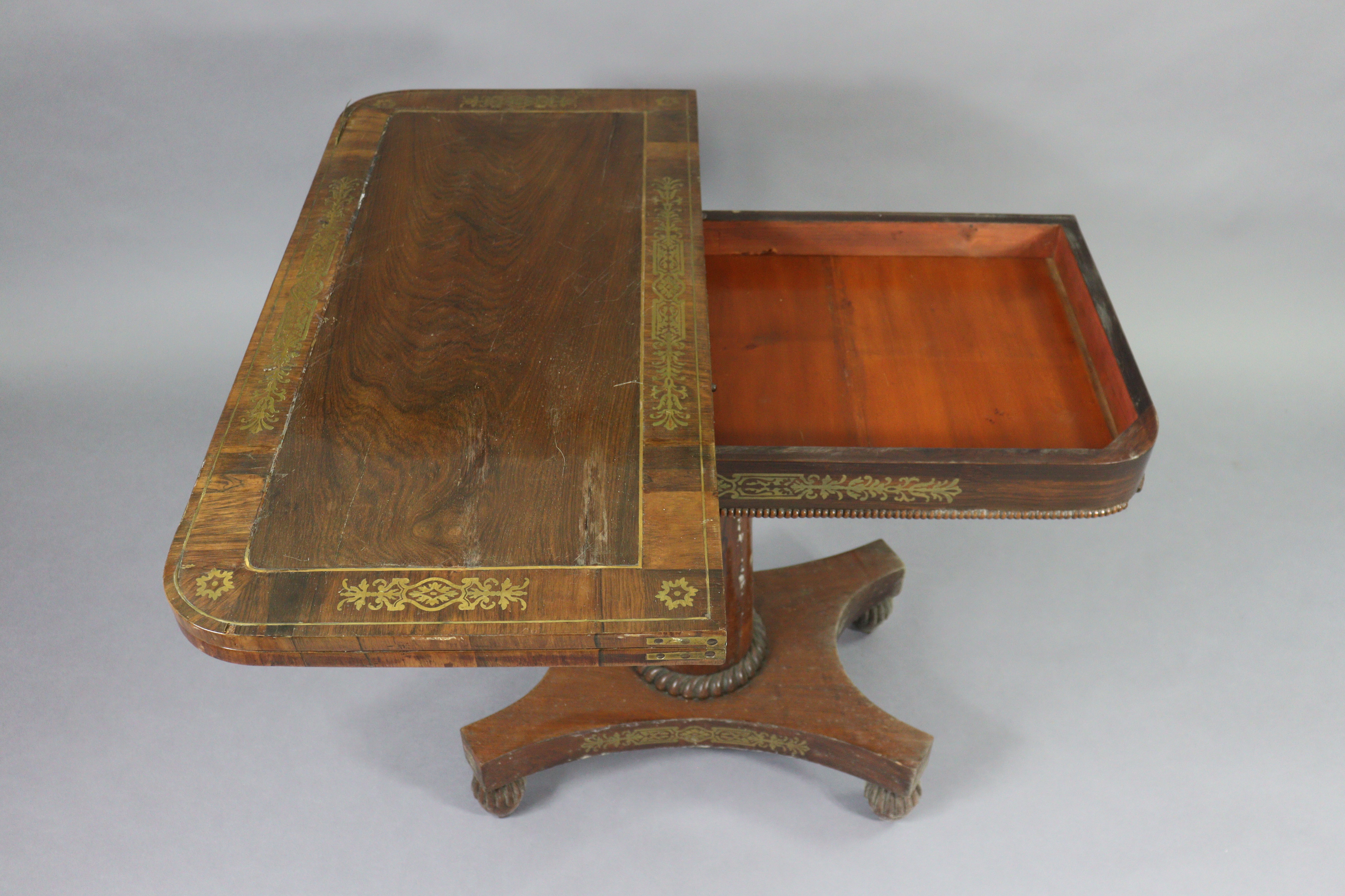 An early 19th century brass-inlaid card table, with rounded corners to the rectangular top, inset gr - Image 4 of 5