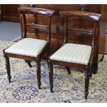 A pair of Regency simulated rosewood dining chairs with padded drop-in seats, & another Regency dini