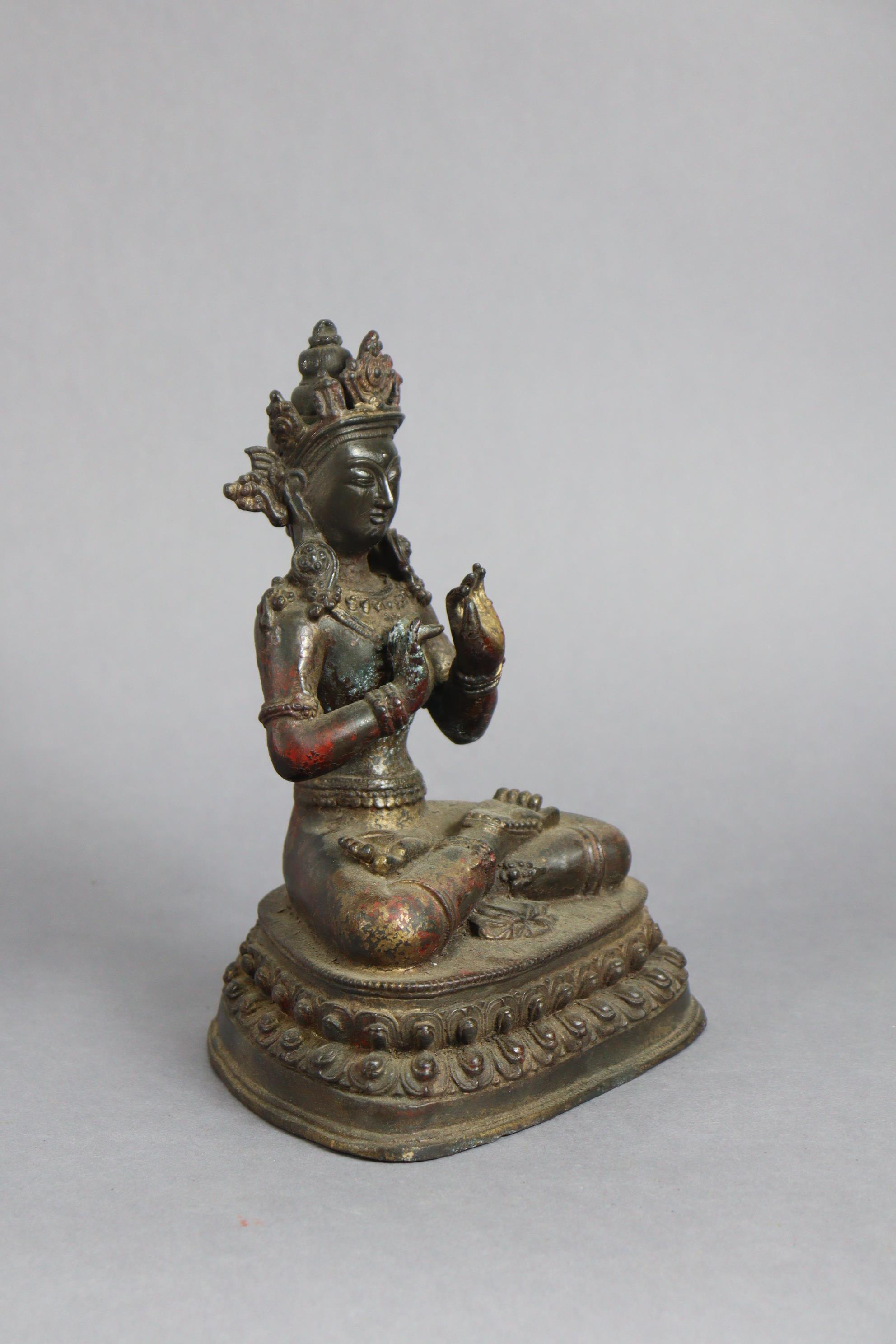 A Sino-Tibetan bronze model of a Boddhisattva, seated on double-lotus base, 9½” high. - Image 2 of 6