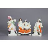 A Victorian Staffordshire pottery flat-back group of male & female figures seated on a sofa, 10”