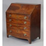 An 18th century oak bureau, with fitted interior enclosed by sloping fall-front above four long