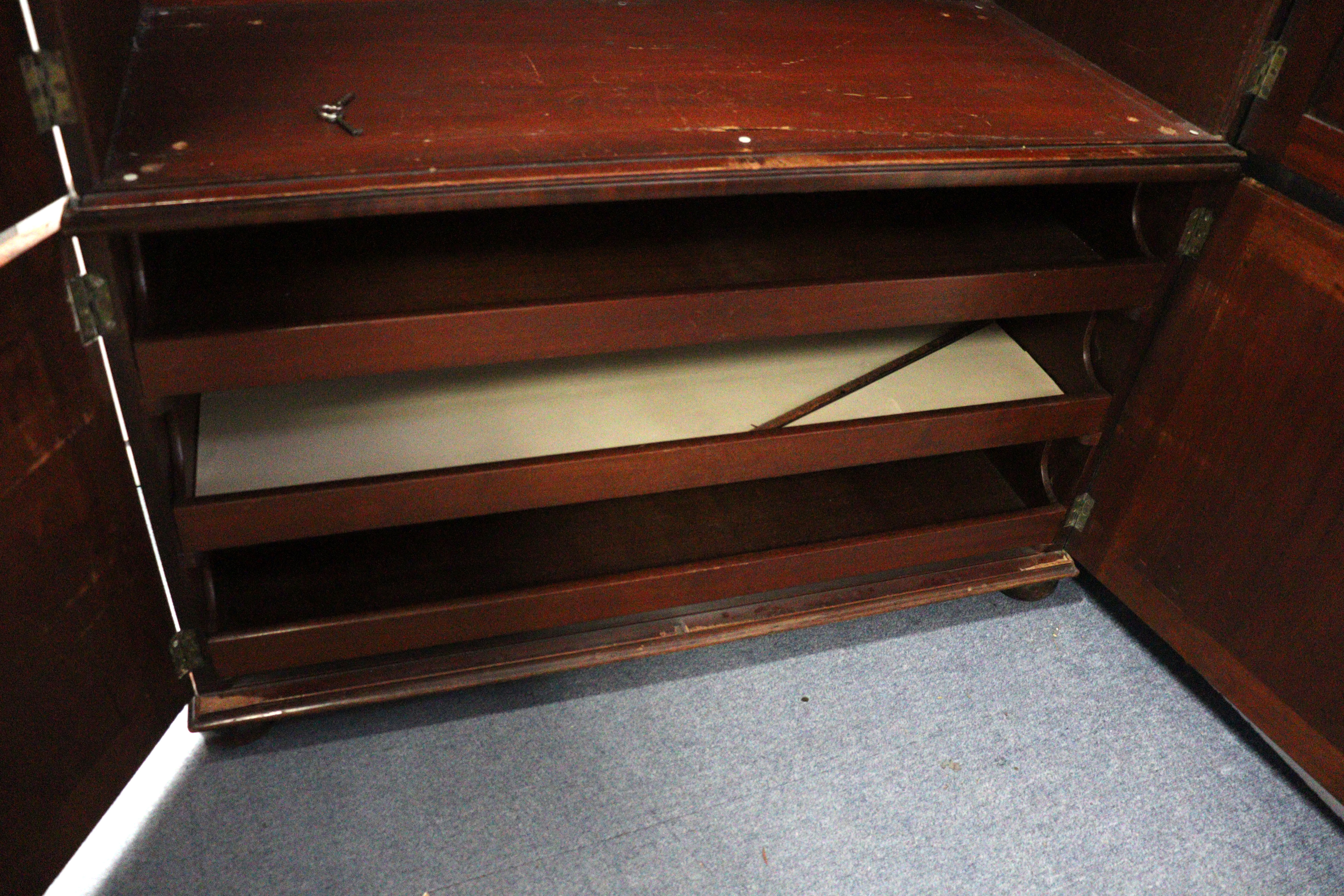 A 19th century inlaid mahogany wardrobe with a hanging compartment enclosed by pair of panel - Image 5 of 7