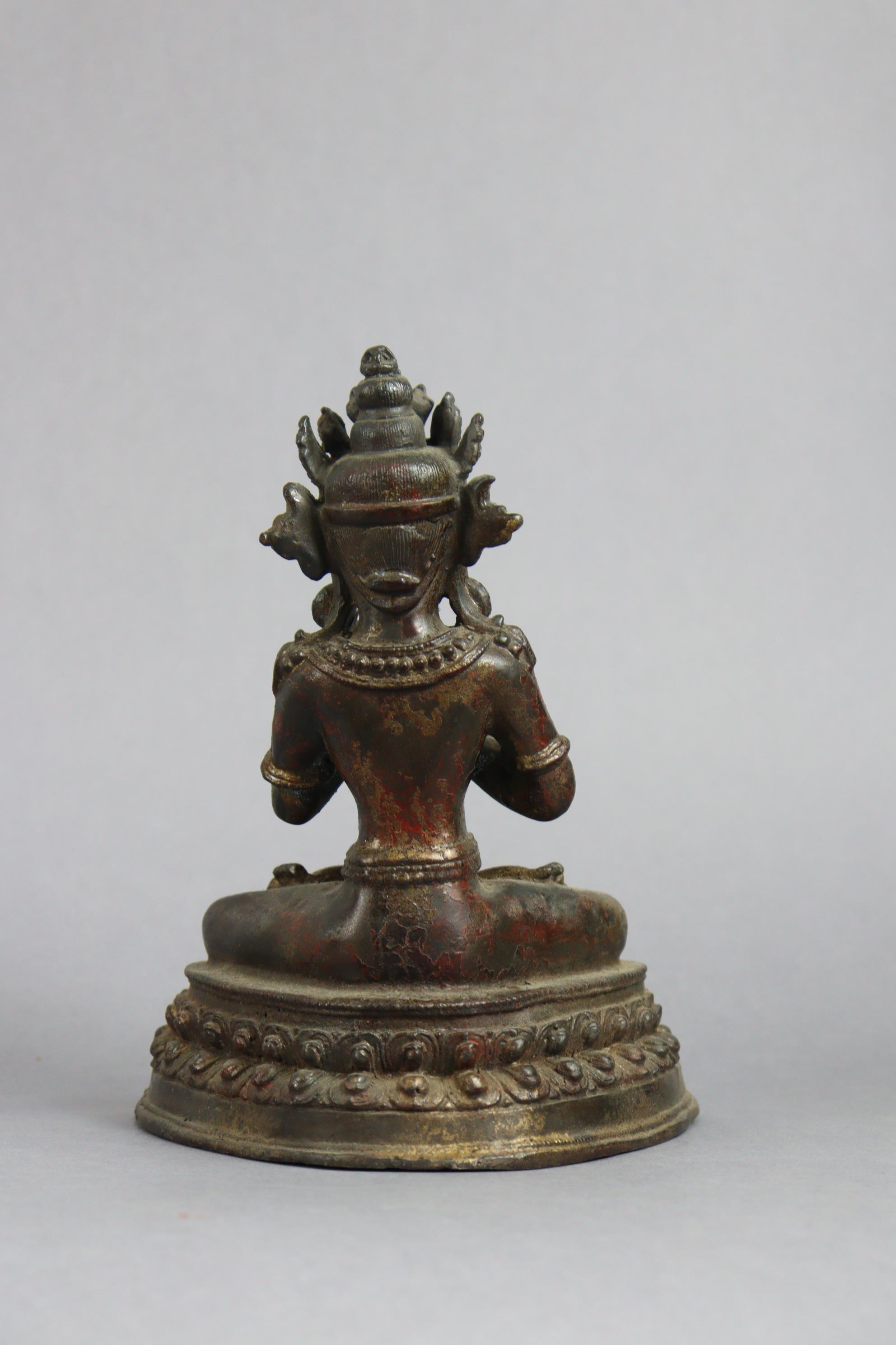 A Sino-Tibetan bronze model of a Boddhisattva, seated on double-lotus base, 9½” high. - Image 4 of 6