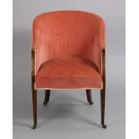 A 19th century inlaid mahogany occasional chair with padded back, seat, & arms upholstered pink