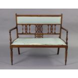 An inlaid mahogany frame two-seater sofa, with padded back & seat upholstered light blue fabric,