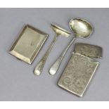 An Edwardian silver rectangular card case with hinged lid & engraved scroll decoration, Birmingham