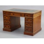 A Victorian mahogany pedestal desk, inset tooled leather to the rectangular top, fitted with an