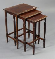 An Edwardian inlaid-mahogany nest of three rectangular occasional tables each table on four square