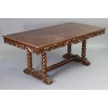 A Carolean-style dining table with a gadrooned edge to the rectangular top, having a pierced frieze,