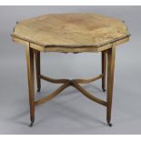 A 19th century inlaid rosewood centre table, with moulded edge to the shaped octagonal top, on