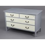 A white & pale blue painted dwarf wooden chest fitted two short & two long graduated drawers with