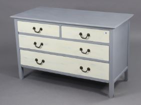 A white & pale blue painted dwarf wooden chest fitted two short & two long graduated drawers with