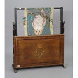 A marquetry-inlaid wooden panel, 30” x 19”; & a tapestry frame, 31½” wide.