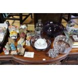 Three glass fruit bowls; a glass decanter; a needlework picture; various decorative ornaments, etc.