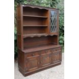 A ditto smaller wall unit, 56½” long x 76½” high.