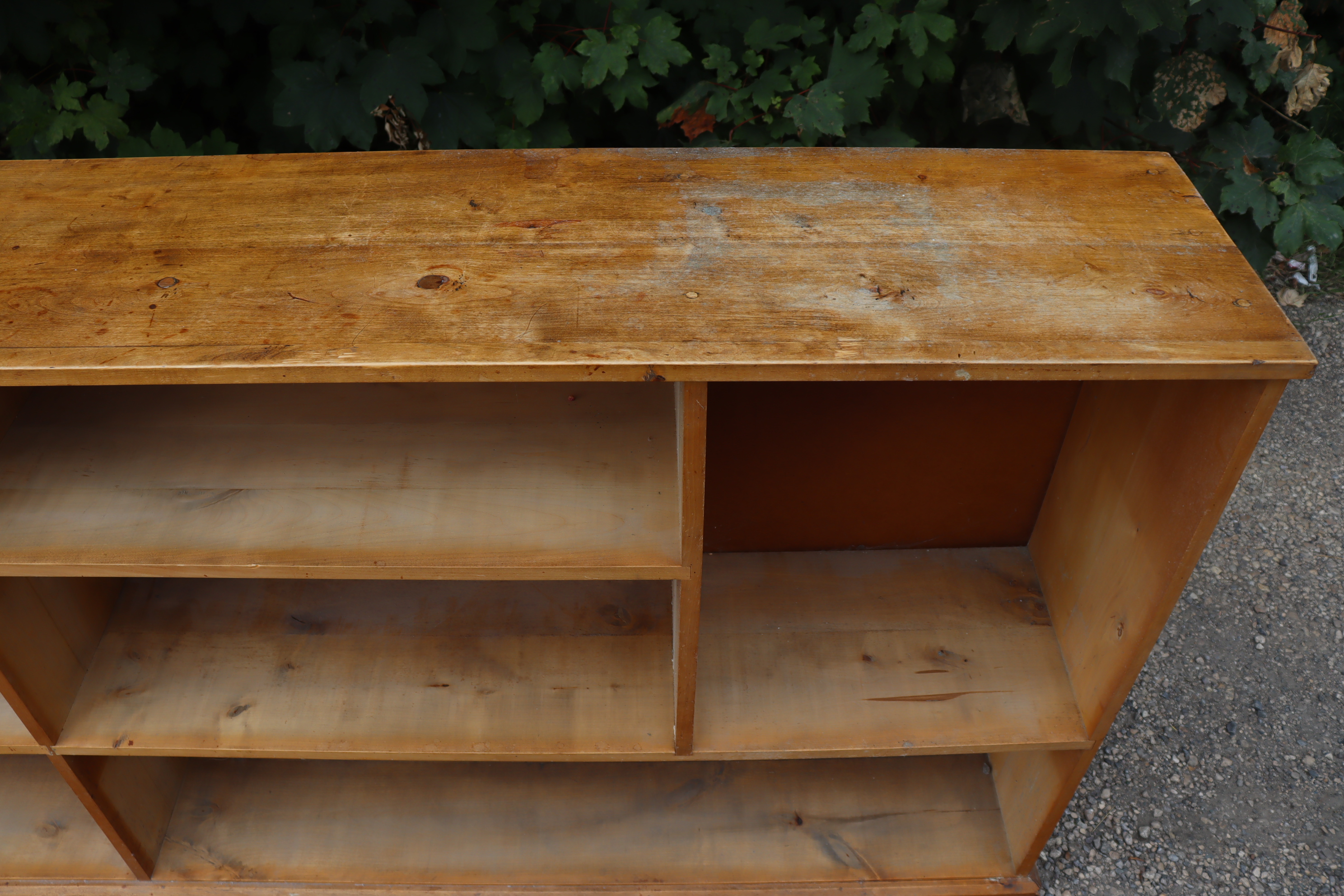 An elm dwarf standing long open bookcase with eight divisions, & on a plinth base, 97” long x 39” - Image 4 of 5