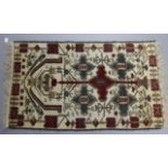 Two Kilim rugs, and a Persian prayer rug.