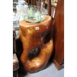 A sculptured hardwood stand inset with a glass bowl, 27” high.