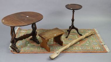 An oak oval drop-leaf occasional table, 20½” wide x 19” high; together with an oak footstool; a