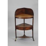 A Georgian mahogany bow-front corner washstand, with tall stage back fitted with single central