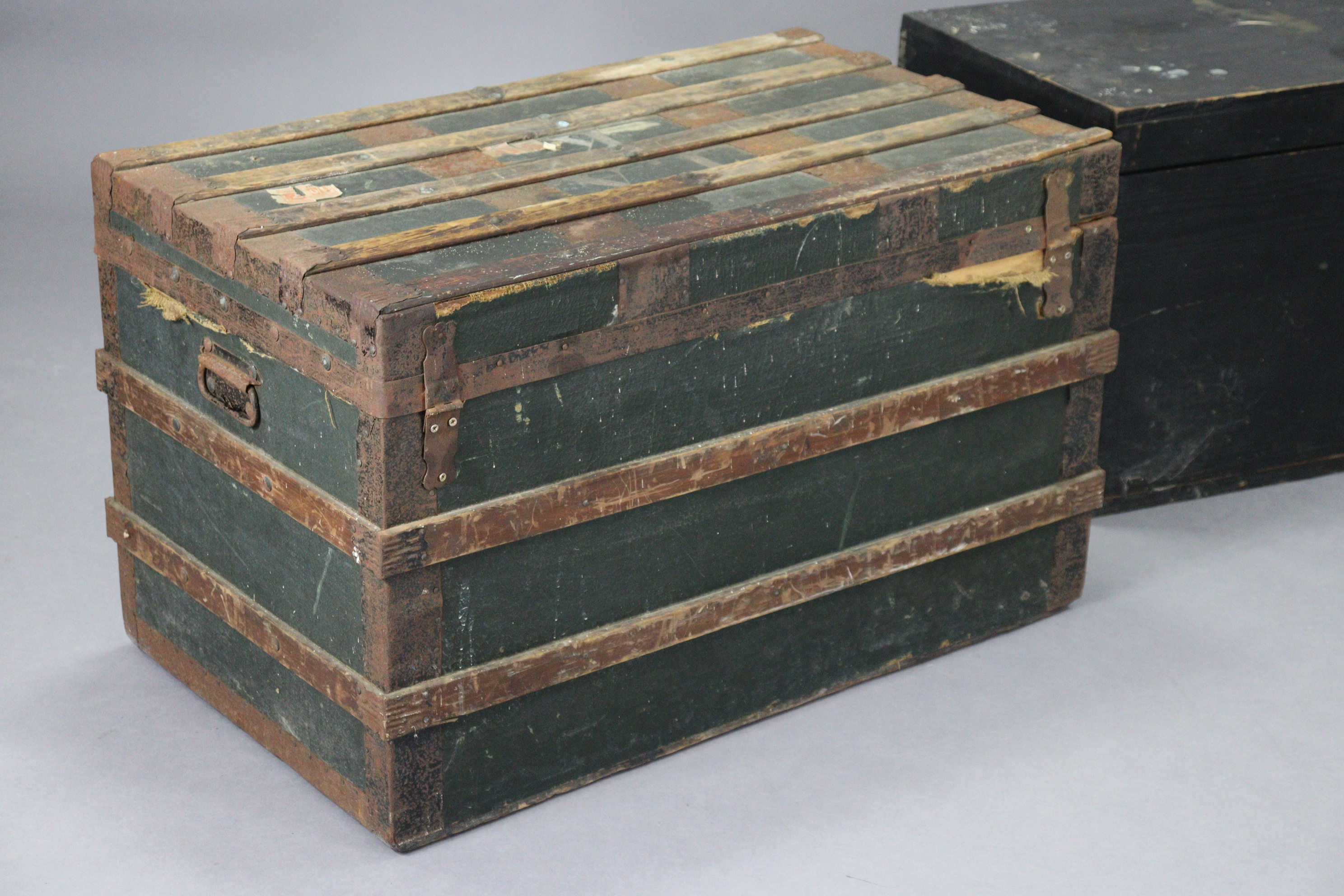 A black painted deal travelling trunk with a hinged lift-lid & with iron side handles, 38” wide; & a - Image 9 of 9